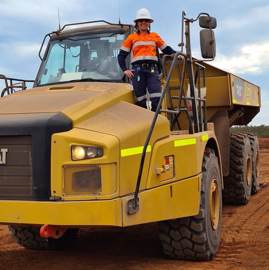Stace on a CAT 745C dump truck at the mine site